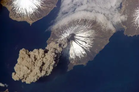 why do volcanoes erupt