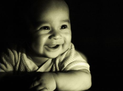 Why do babies smile